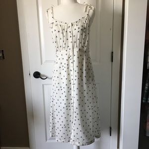 White tie strap dress with blue birds and buttons